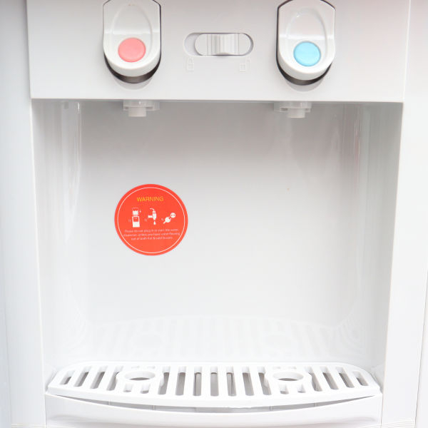 BALTRA Belly Standing Water Dispenser | 2 taps for hot & normal water | Heating capability: 5 L/hr | Heating temperature: 90°C | Made with ABS material | Cabinet & storage compartment | 550 W | 12 months warranty - Image 5